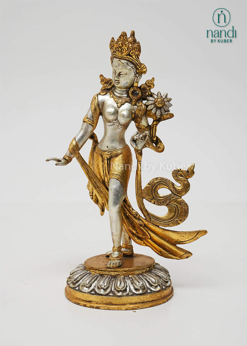 Elegant Tara standing statue in silver and gold finish, symbolizing compassion, wisdom, and serenity while enhancing any sacred or decorative space.